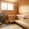 A warm wooden sauna interior with natural light — representing body comfort traditions across world cultures